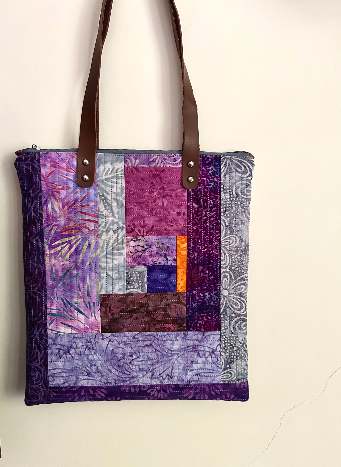 Handmade textile tote bag in purple tones
