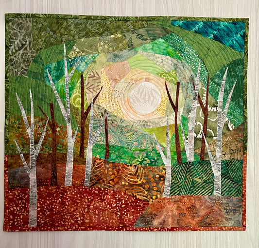 Framable landscape fiber art quilt titled Into the Woods