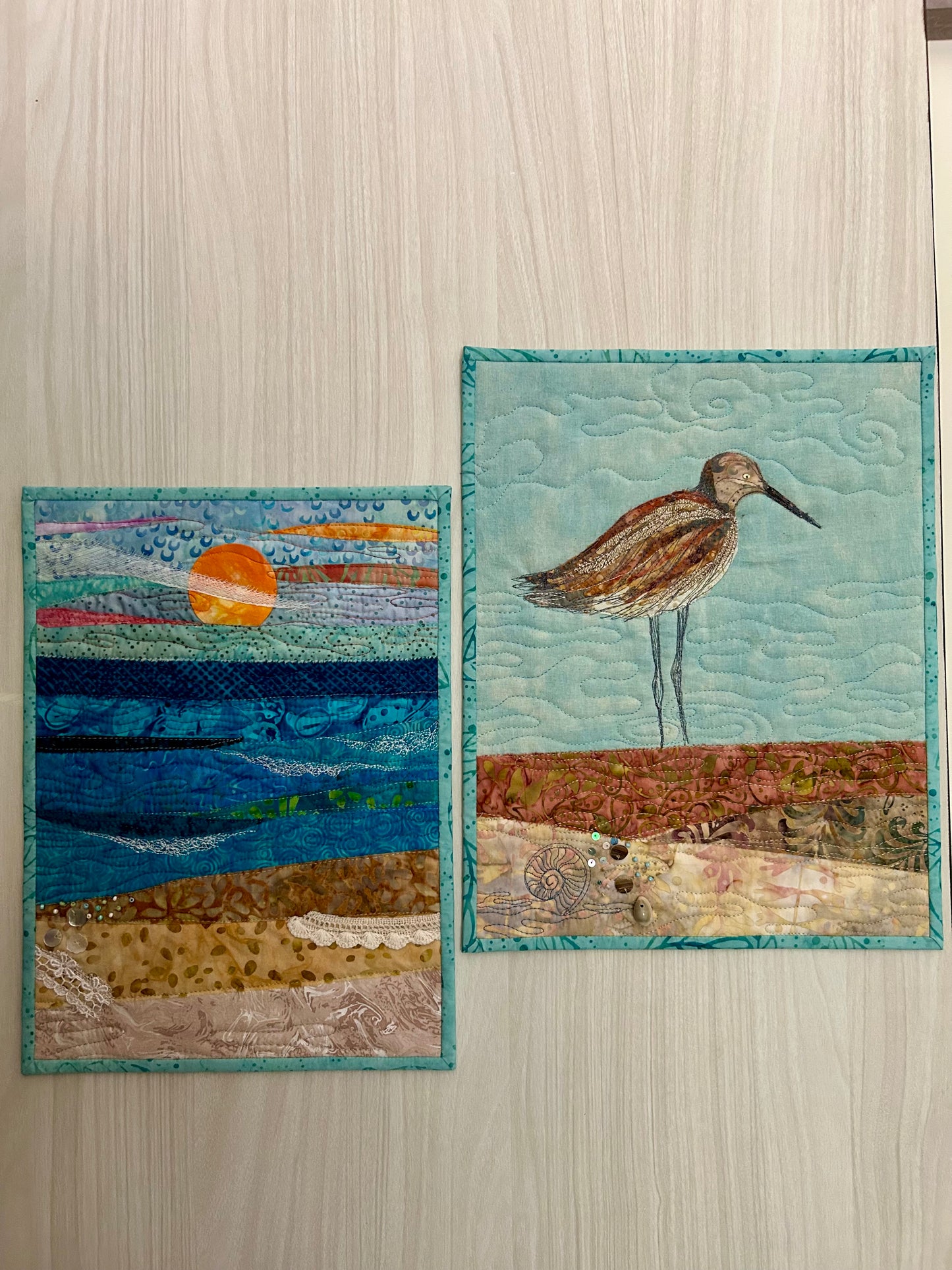 Beach house decor with coastal quilt on display