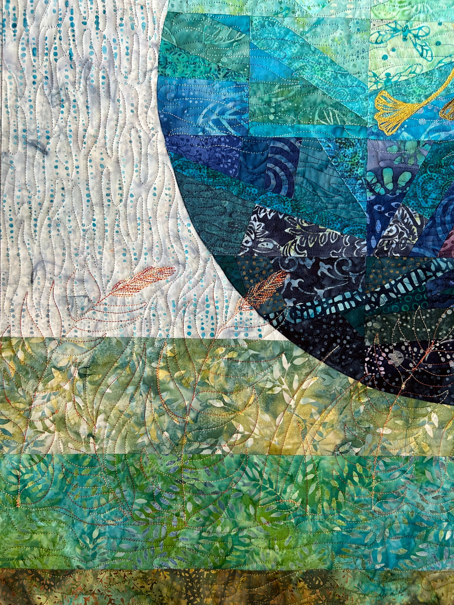 Close-up showing quilting on lunar quilt