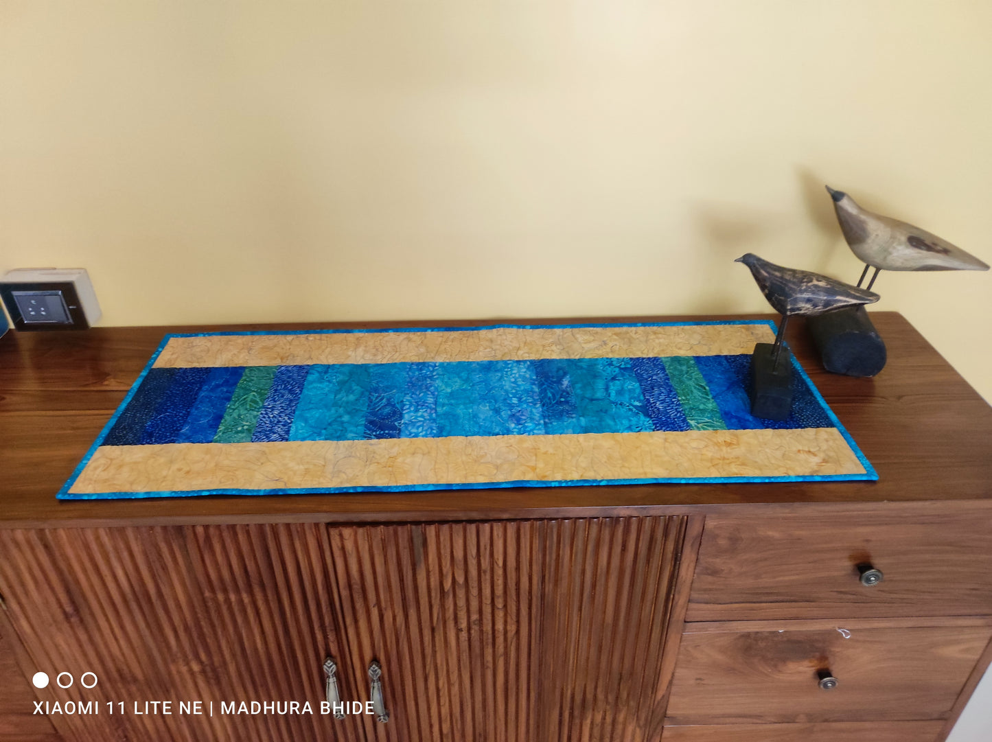 Ocean theme runner on wooden console