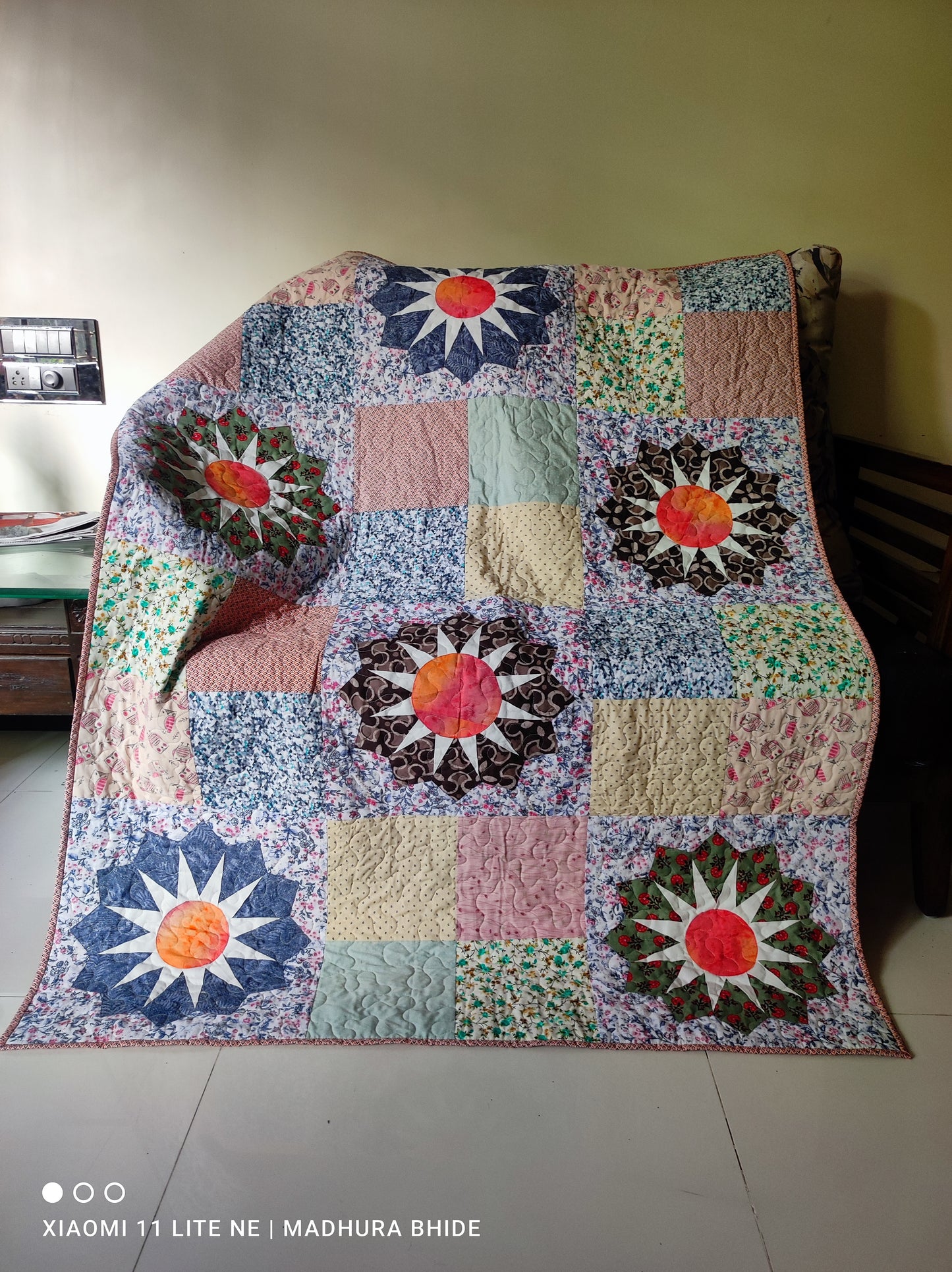 Handmade Dresden Plate throw quilt with vibrant scrappy design
