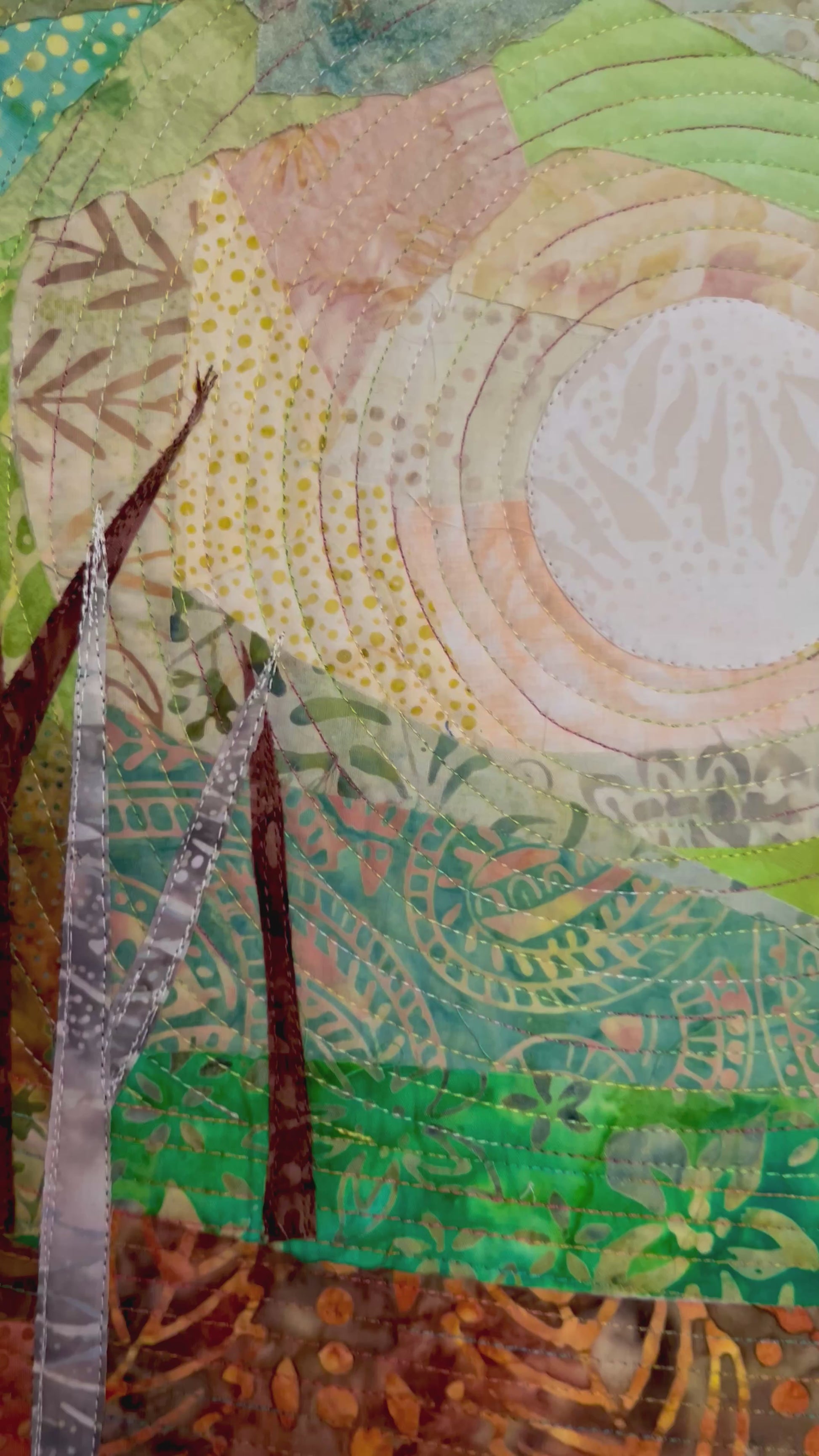 Video showing details of into the woods art quilt