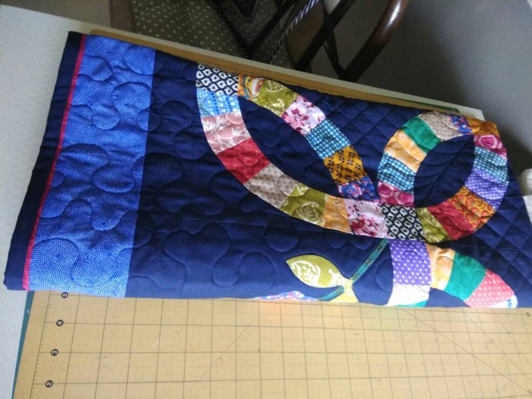 Folded blue wedding ring quilt