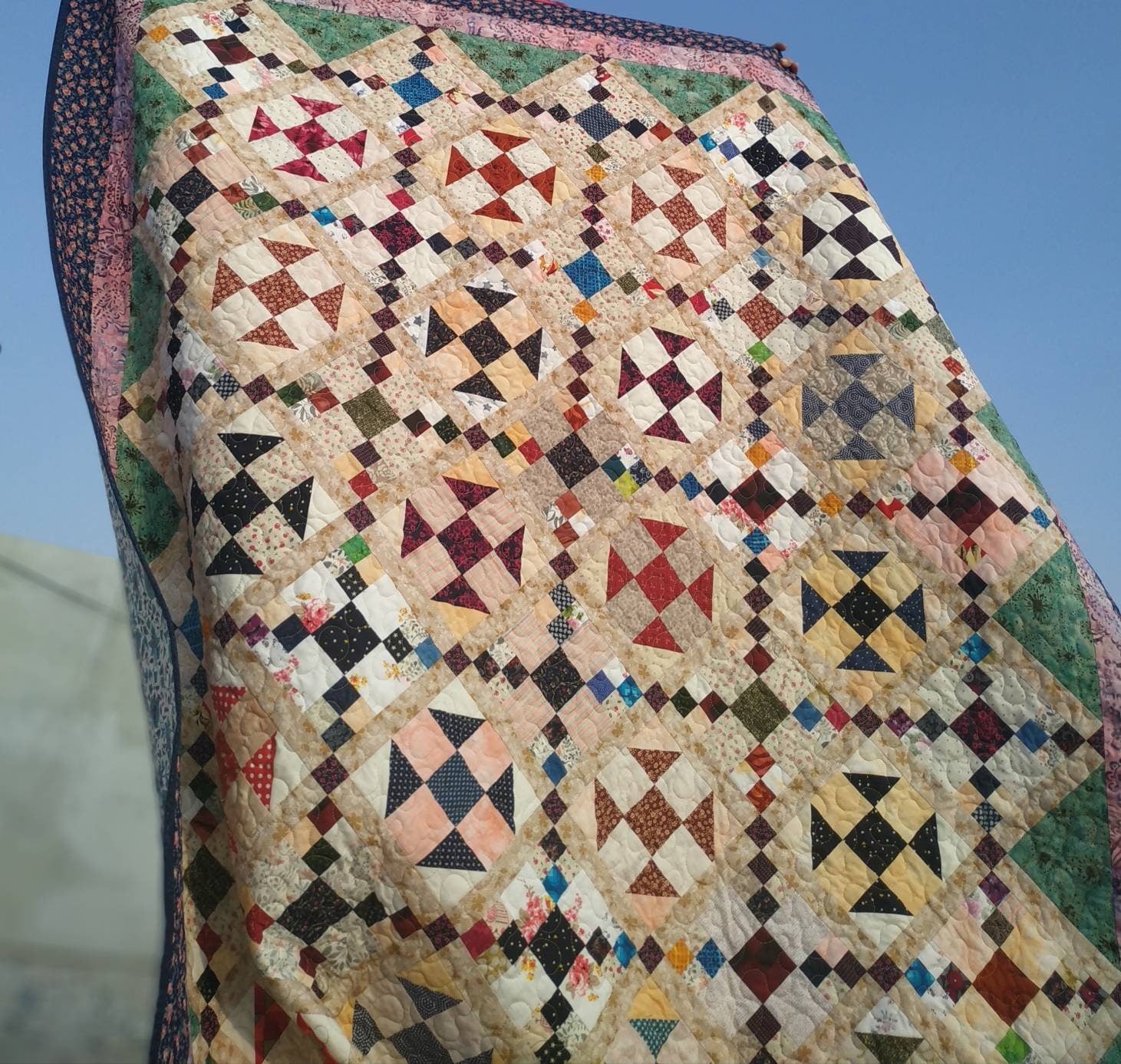 Vintage style full size quilt in natural light