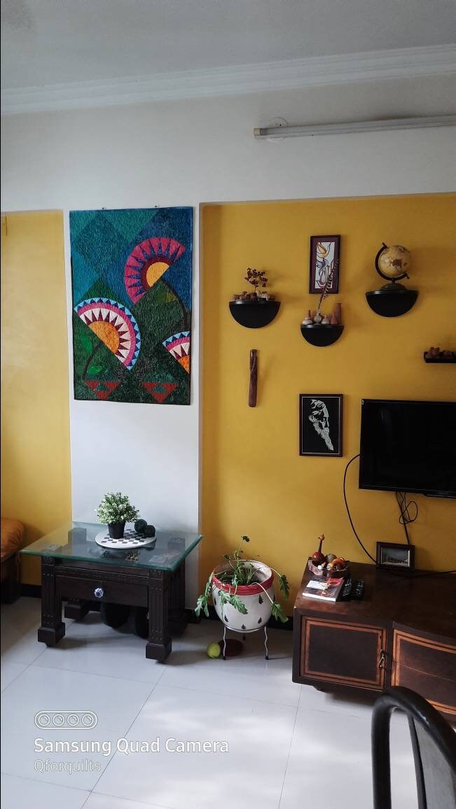 Art quilt displayed on wall