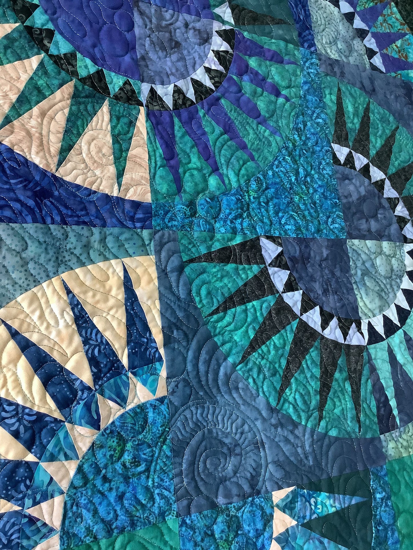 Ocean Waves Art Quilt featuring New York Beauty design in deep blue tones.