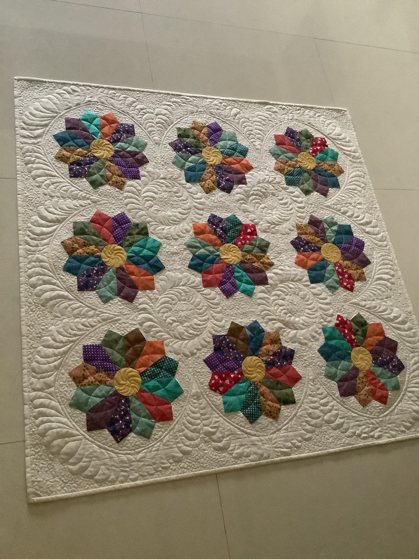 Dresden’s plate quilt on floor