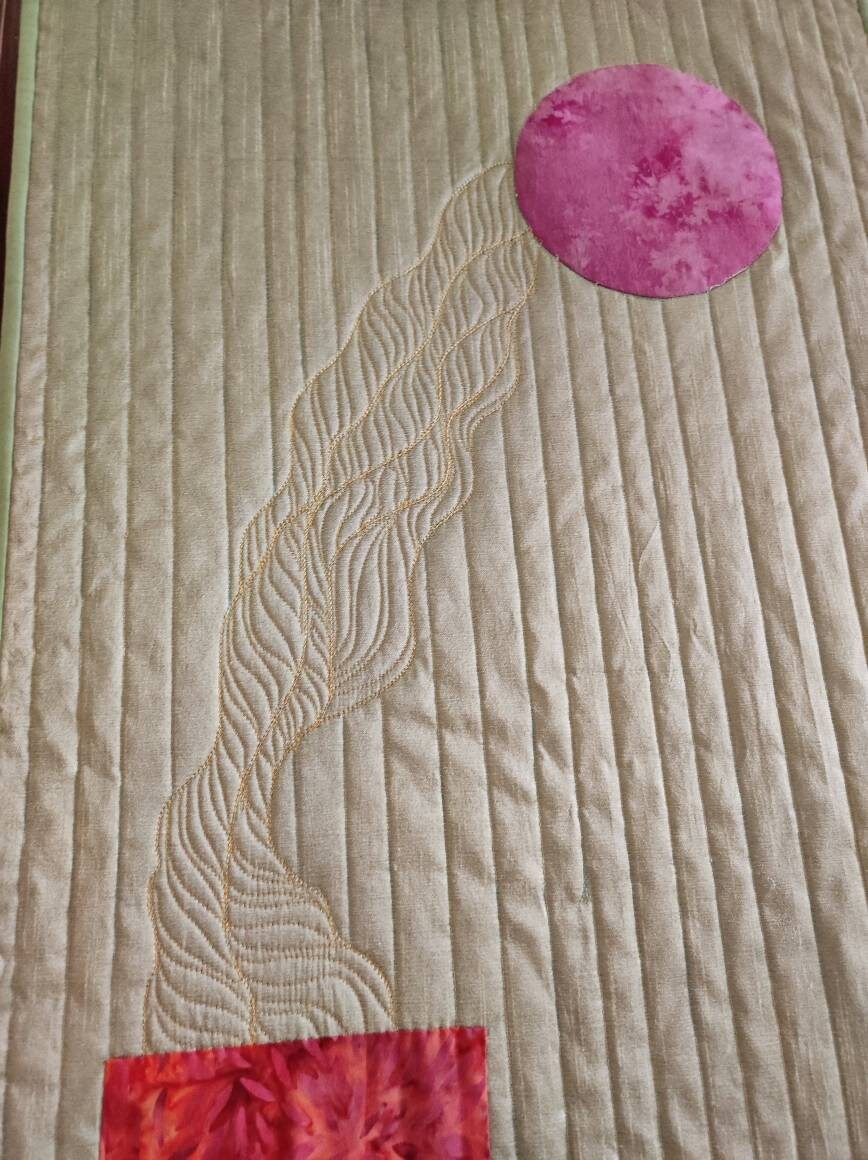 Close-up of purple moon detail on the Silk Walk art quilt