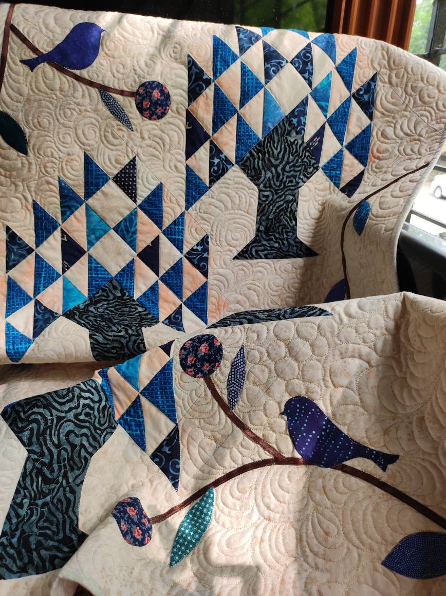 Close up showing tree block on quilt
