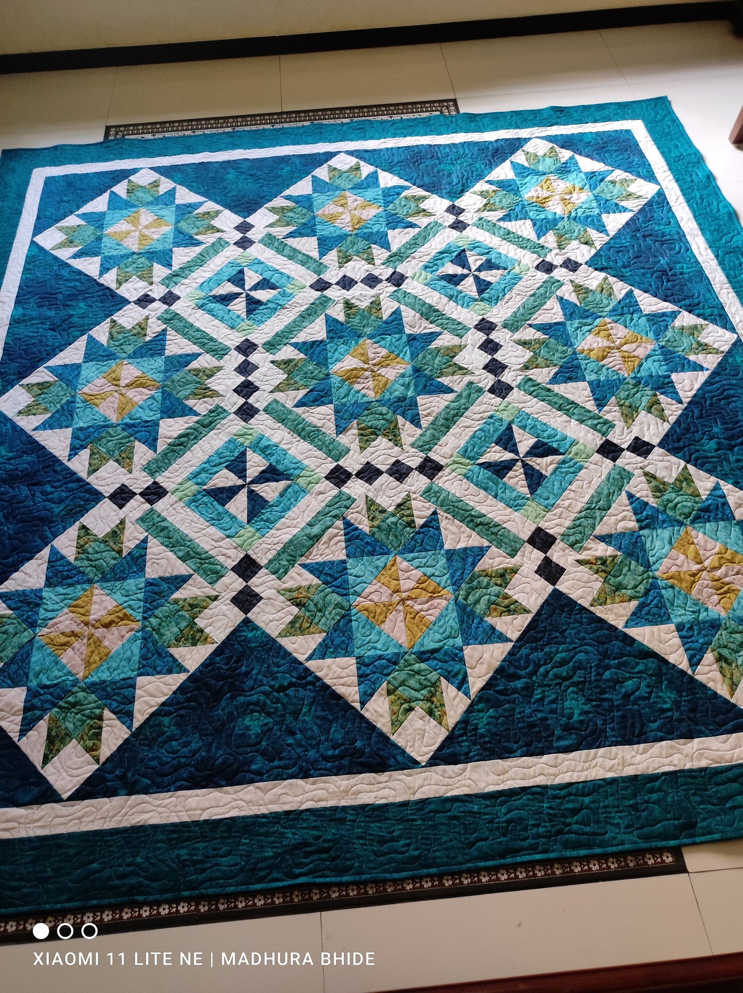 Fulll green and blue quilt
