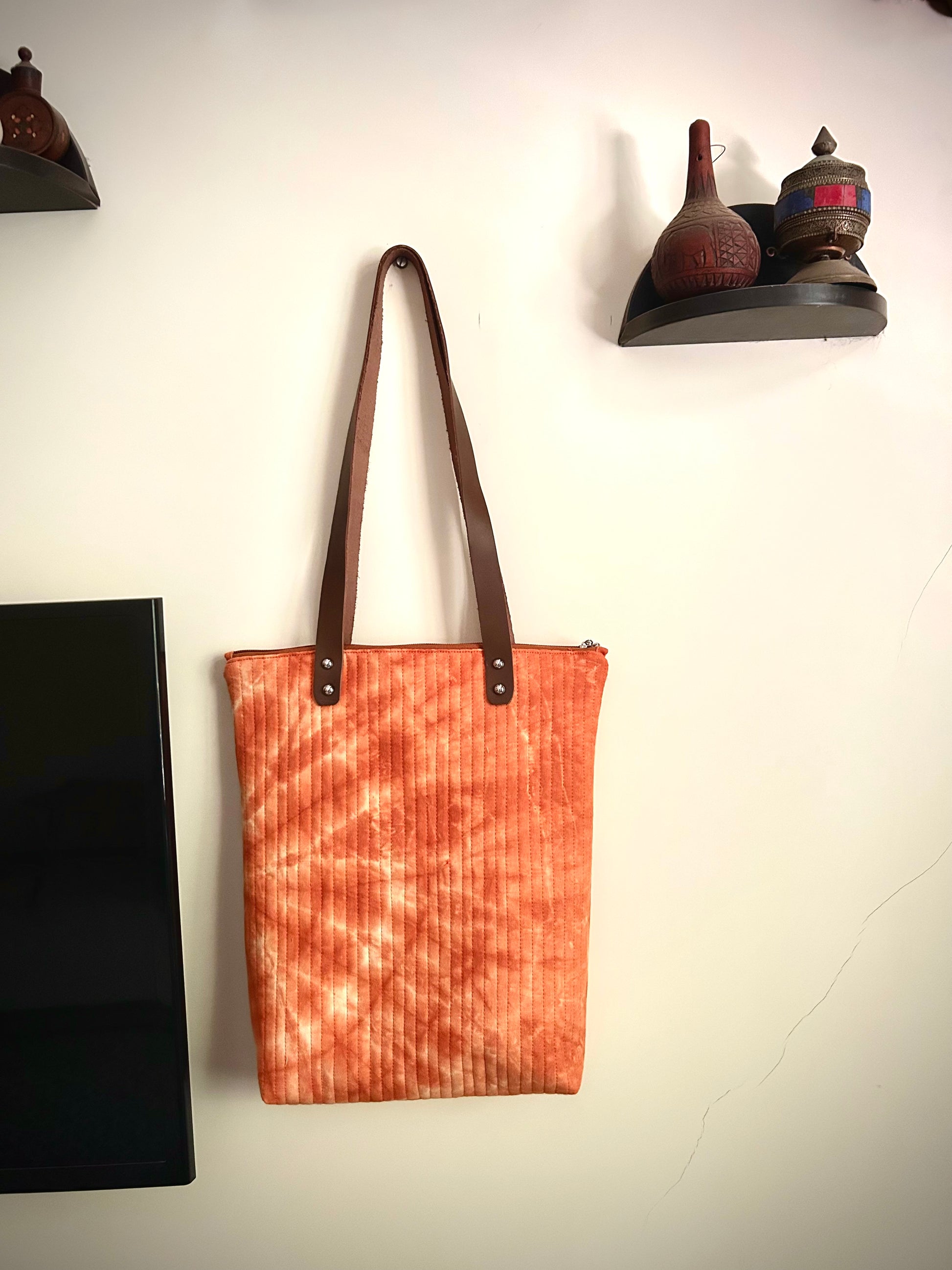 Other side of rust orange tote bag