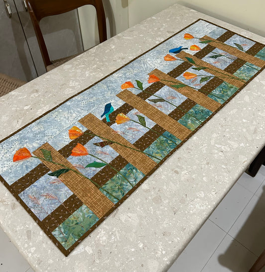 Handmade floral quilted table runner with fence flower design
