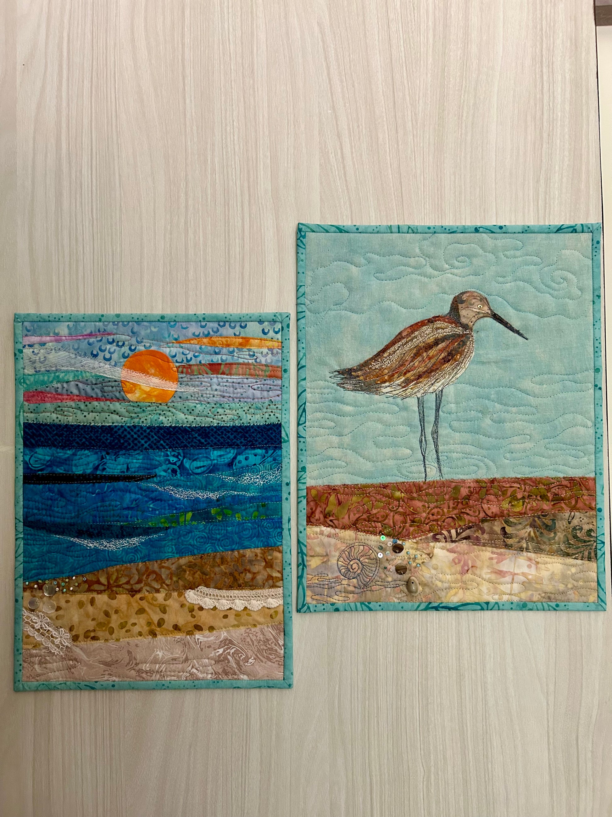 Beach house decor with coastal quilt on display