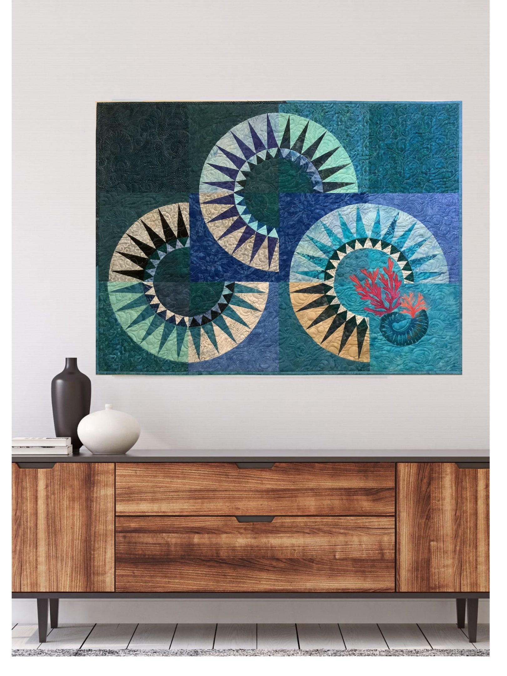 Ocean Waves fiber art quilt on wall above wooden console 