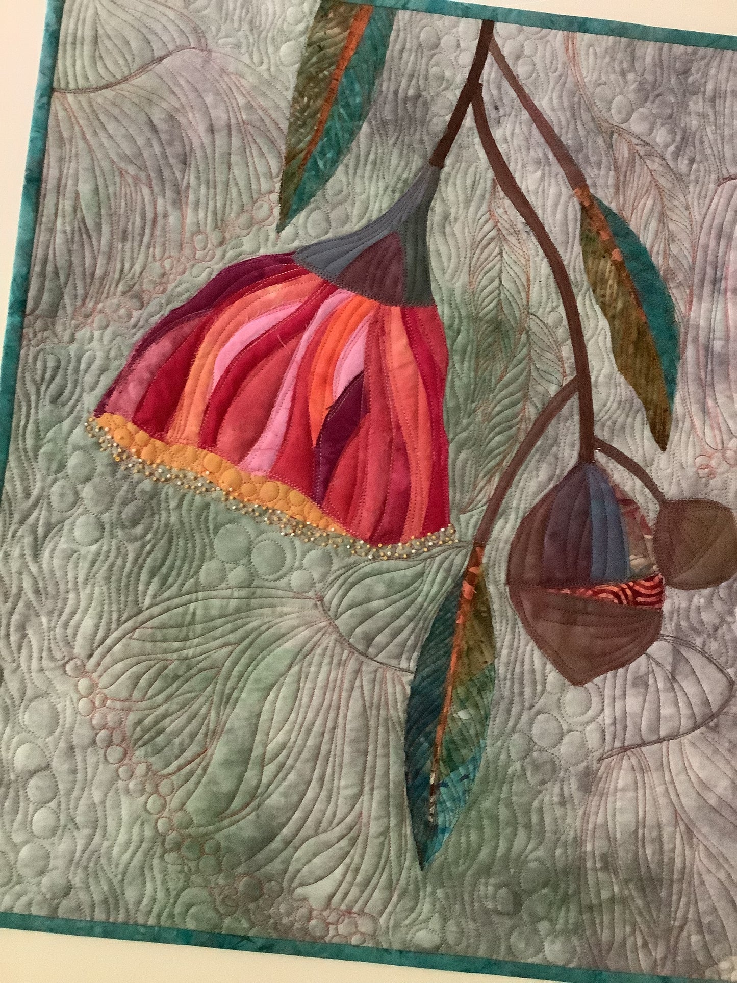Beads embellishments on quilt