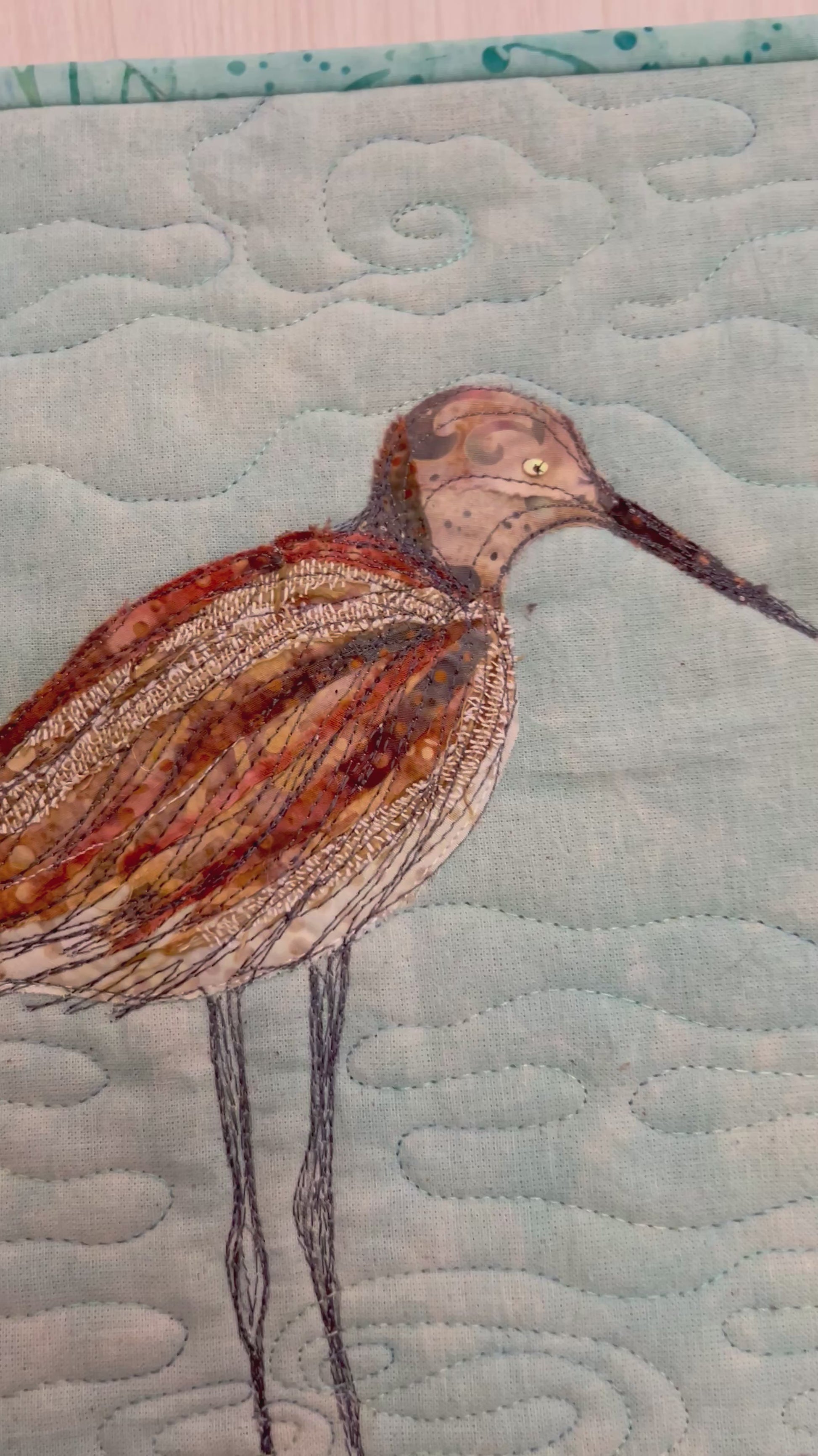 Video of bird quilt showing details 