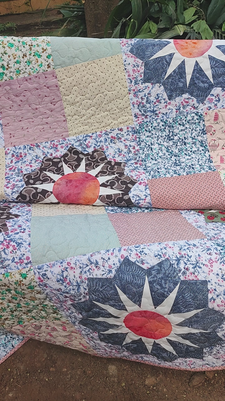 Video showing details of Dresden plate scrappy quilt