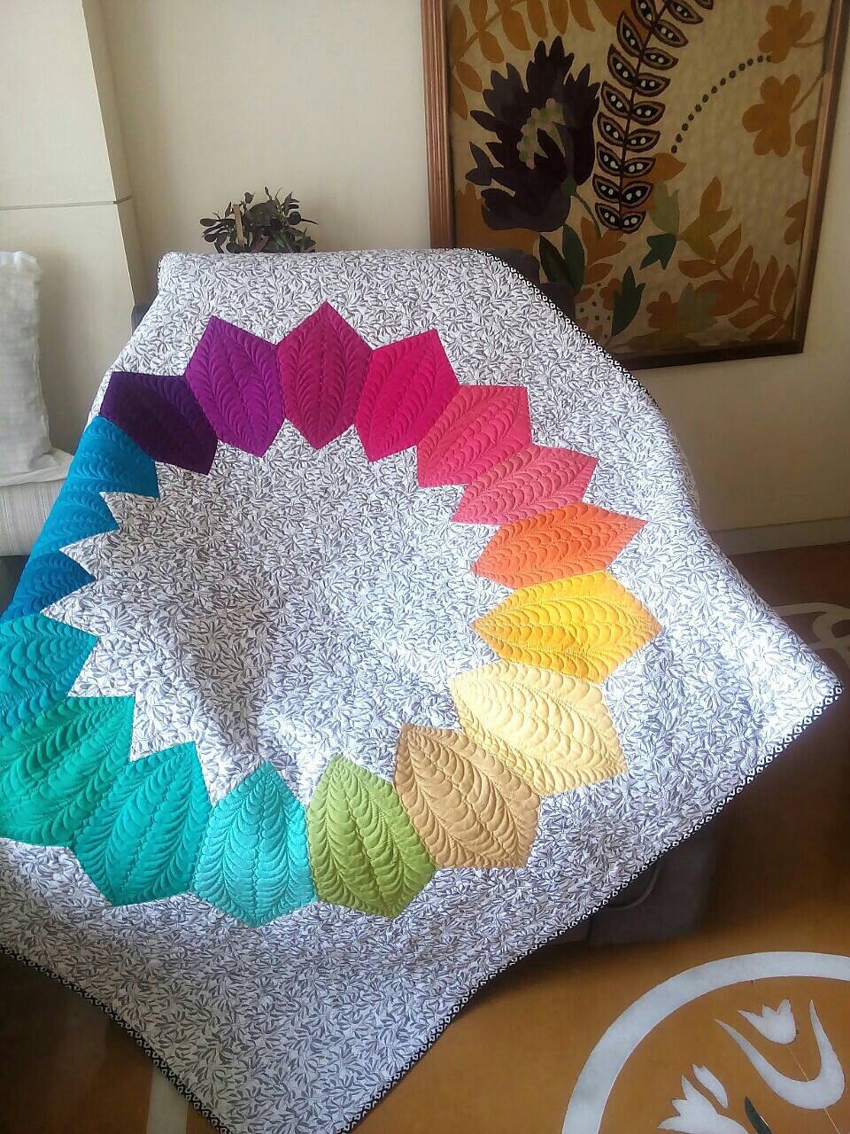 Ombré throw quilt styled on chair