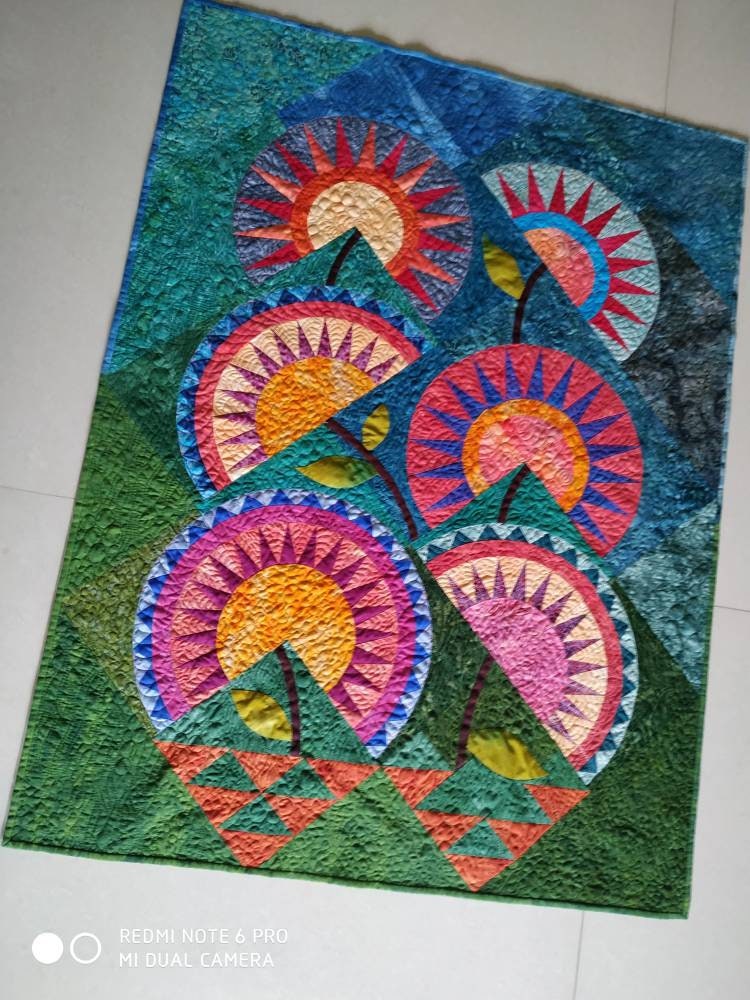 Art quilt laid on the floor