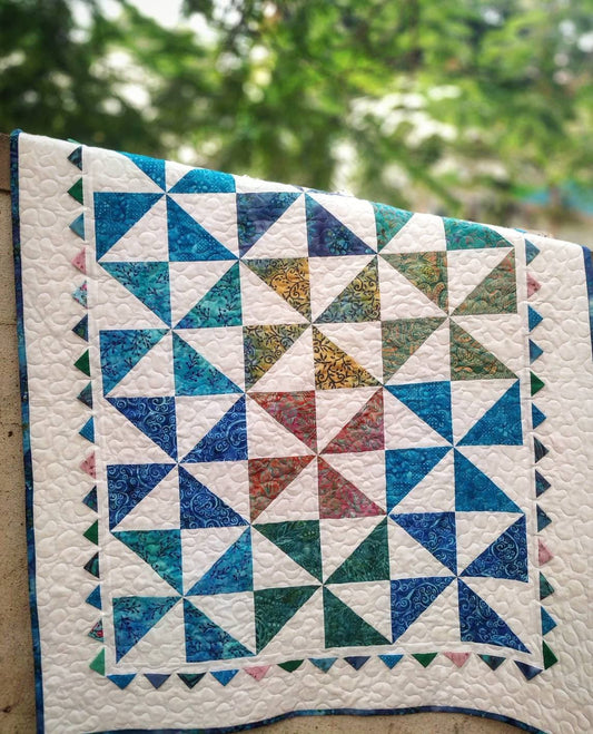 Pinwheel baby quilt