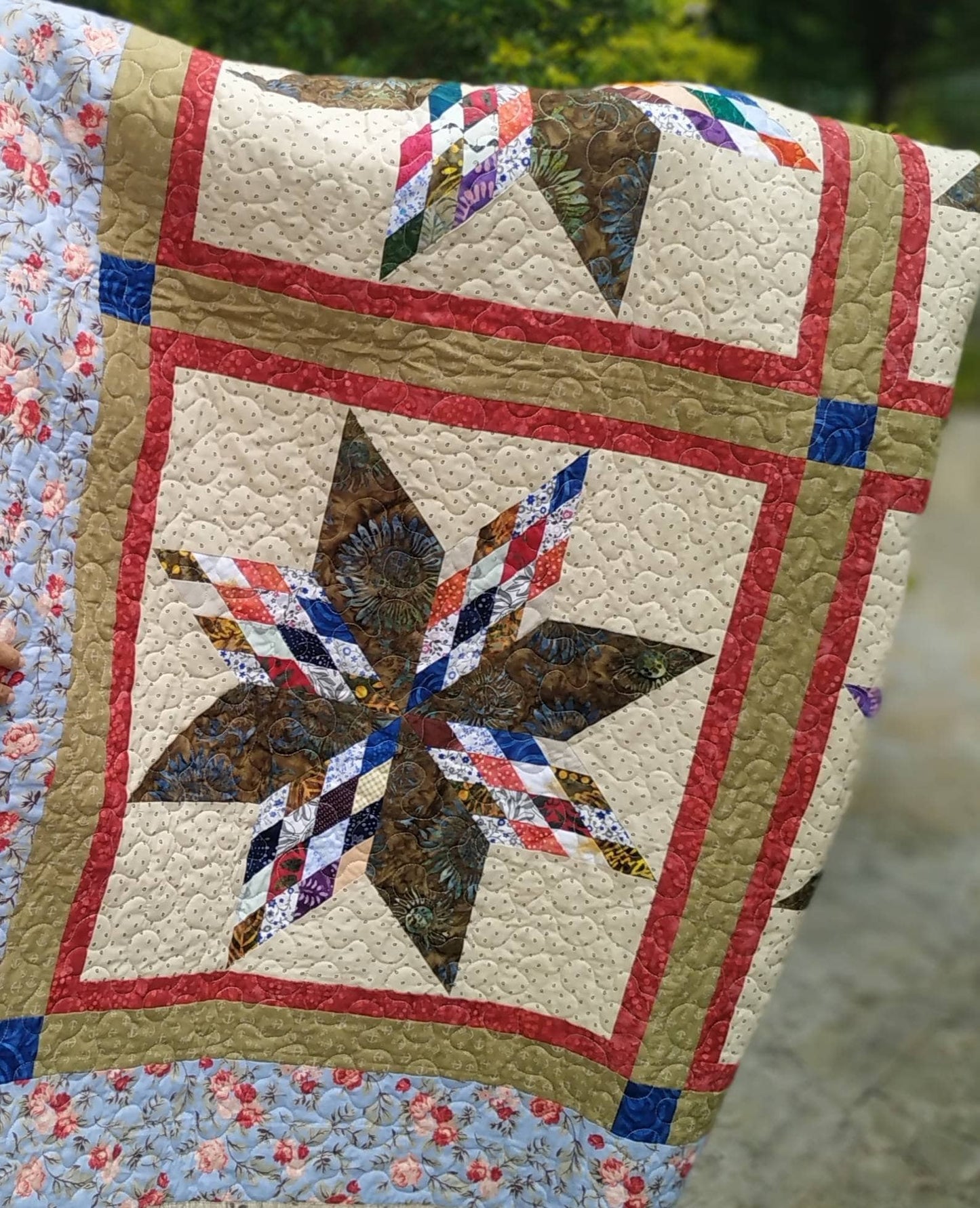 Details of star throw quilt