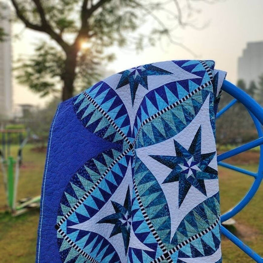 Picture of something blue quilt in a garden