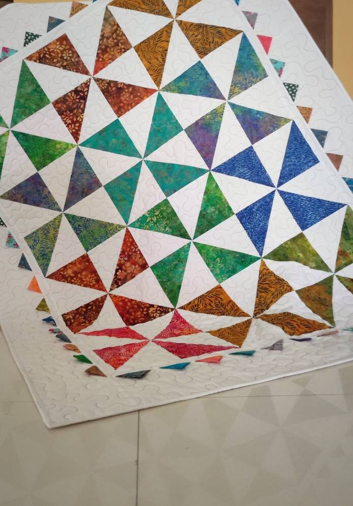 Beautiful rainbow pinwheel baby quilt 