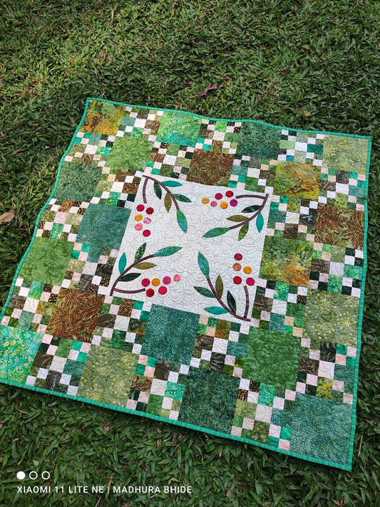 green throw quilt 